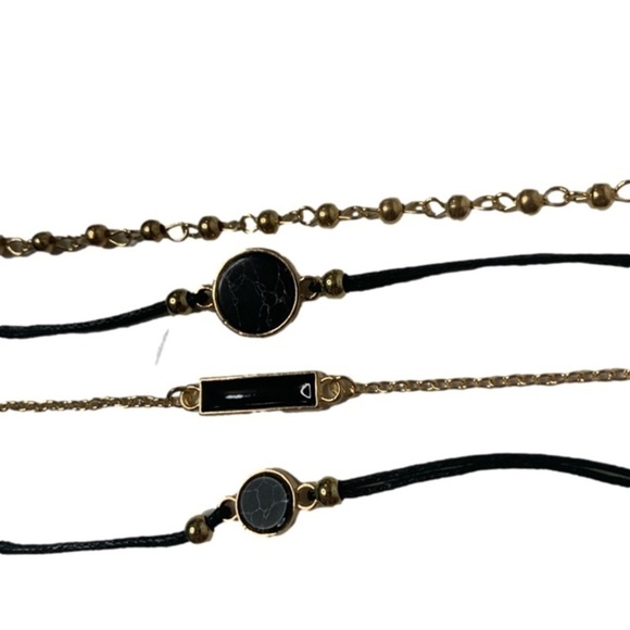 Golden black set of four bracelets - Picture 1 of 4